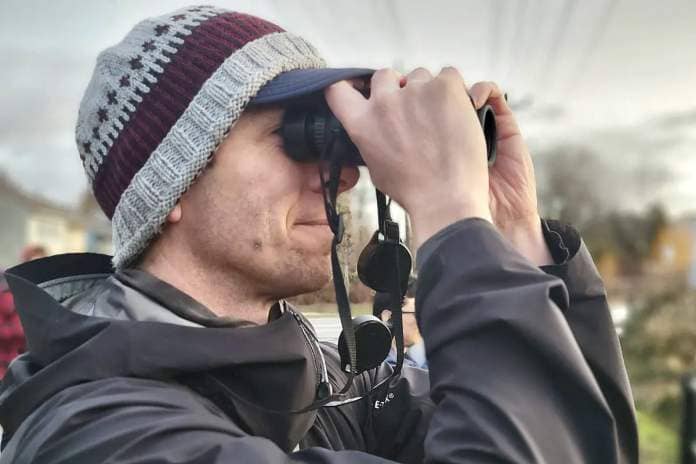 Colin O’Byrne demonstrated proper bird watching form during the fifth annual Christmas Bird Count for Kids (CBC4Kids) at Langley City’s Brydon Lagoon on Saturday, Dec. 31, organized by the Langley City-based Explore Science Club. (Dan Ferguson/Langley Advance Times)