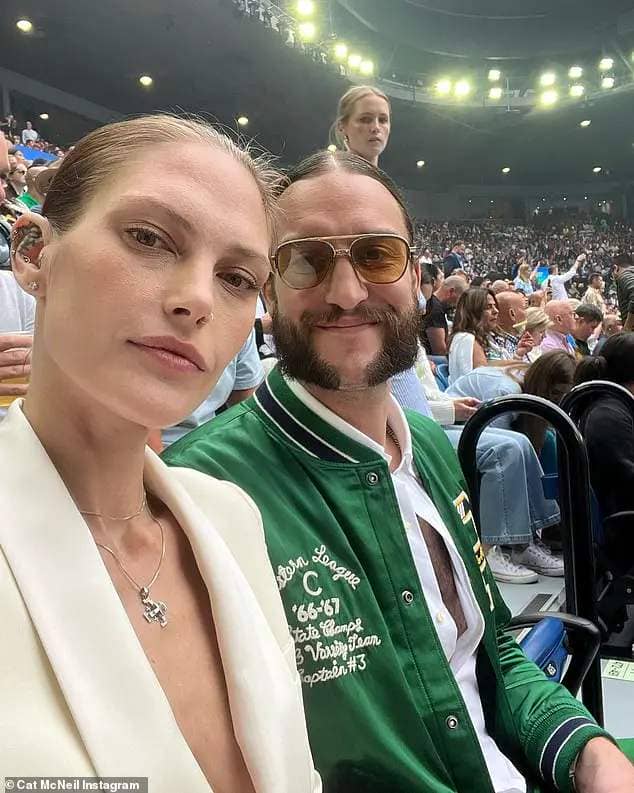 Aussie model Cat McNeil covered up as she attended the Australian Open with her new NBA star husband, Miles Plumlee, in Melbourne on Sunday night