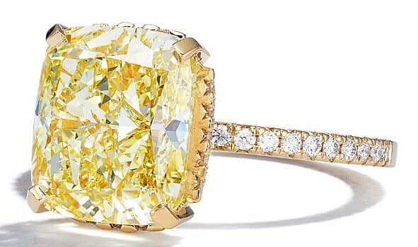 Tiffany Ring in Yellow Gold with a Fancy Yellow Diamond and White Diamonds