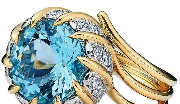 Tiffany & Co Schlumberger Swirl Ring in Yellow Gold and Platinum with an Aquamarine and Diamonds
