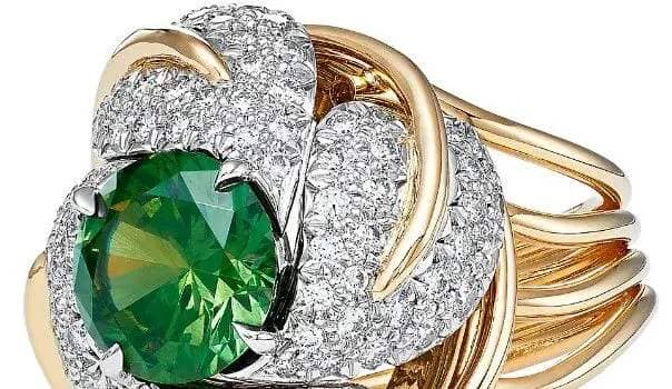 Tiffany & Co Schlumberger Four Flower Ring in Platinum and Gold with an Esteemed Demantoid Garnet and Diamonds