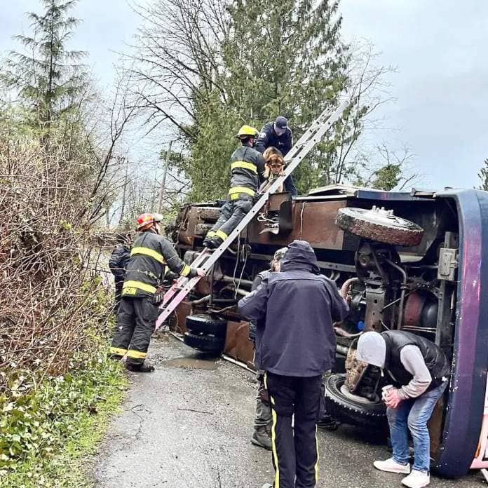 Glen Valley resident Melissa Carson recorded the moment when Langley firefighters rescued a dog from an overturned motorhome that crashed into her driveway on April 20. (Melissa Carson/special to Langley Advance Times)