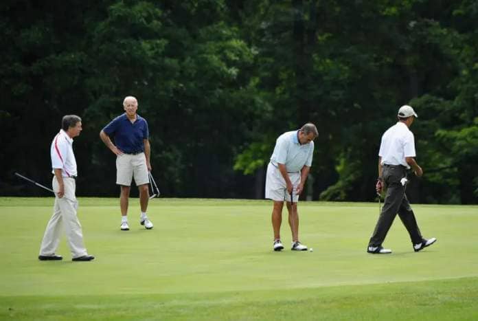 US House Speaker John Boehner (2nd R) putts on the first hole watched by Ohio Governor John Kasich (L), US Vice President Joe Biden (2nd L) and US President Barack Obama (R) during a game of golf June 18, 2011 at Andrews Air Force Base in Maryland. AFP PHOTO/Mandel NGAN (Photo credit should read MANDEL NGAN/AFP via Getty Images)
