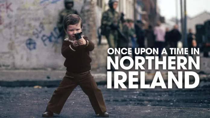 Once Upon a Time in Northern Ireland,Iconic,Child playing with toy gun, Belfast 1980,Homer Sykes,Homer Sykes