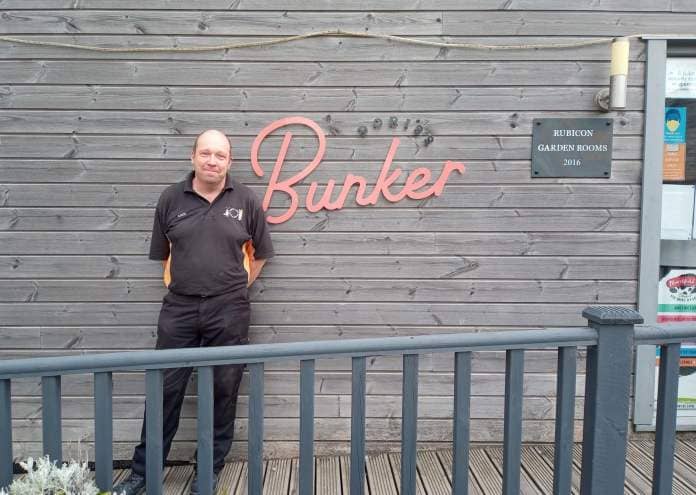 NCAR kennels, IT and reception staff member Andy Horton, outside the welcoming Doriss Bunker cafe at the charitys Trelogan site.