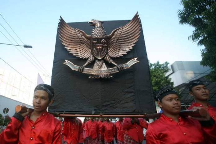 Residents of Blitar, East Java province, carry the Pancasila symbol of Indonesia’s state ideology