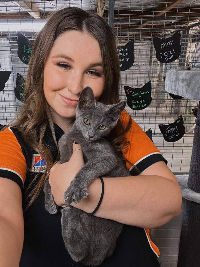 Cat Haven marketing co-ordinator Amber Ashford with Mable.