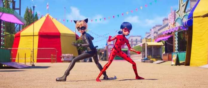 cat noir and miraculous ladybug strike a battle pose in a scene from miraculous ladybug and cat noir the movie, a good housekeeping pick for best kids&#39; movies 2023