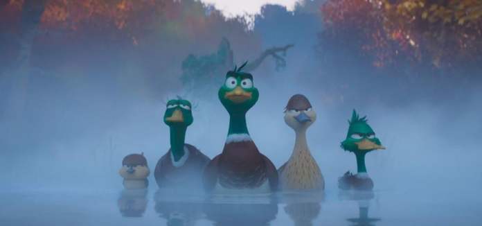ducks float on the water in a scene from migration, a good housekeeping pick for best kids movies 2023