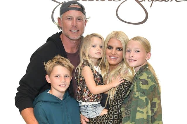 Charley Gallay/Getty for Jessica Simpson Collection Simpson with husband Eric Johnson and their three children