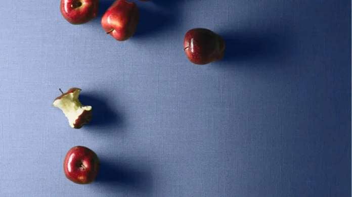 red apples on blue background