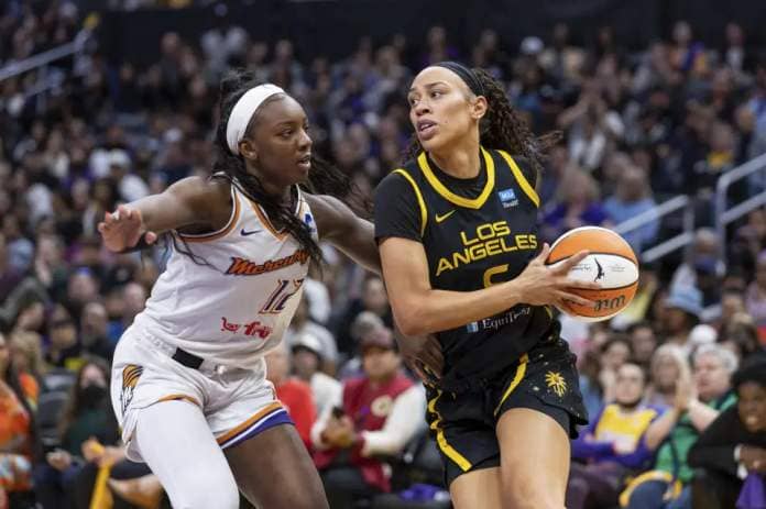 Los Angeles Sparks forward Dearica Hamby drives to the basket while being guarded by Phoenix Mercury forward Michaela Onyenwere during a game May 19, 2023, in Los Angeles. (AP Photo/Jeff Lewis, File)