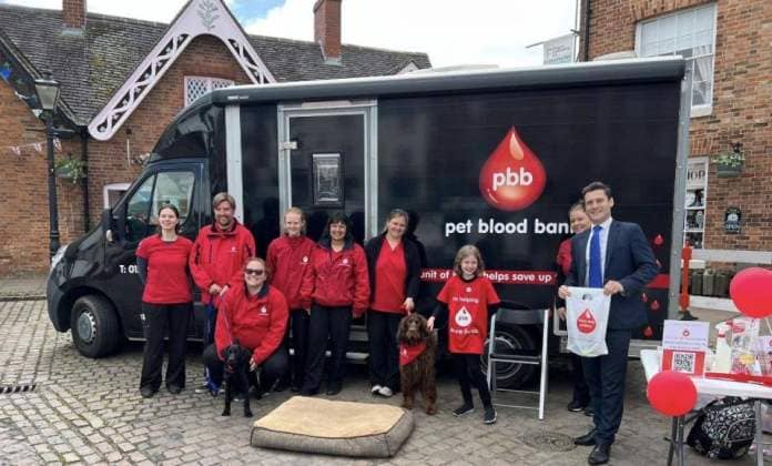 The Pet Blood Bank team with Dr Luke Evans MP. (Photo: Pet Blood Bank)
