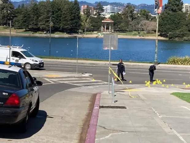 Police technicians gather evidence at a shooting scene at the intersection of Lakeside Drive and Madison Street in downtown Oakland. Lake Merritt is visible in the background.9-4-2023, Oakland CA

(Harry Harris/Bay Area News Group)