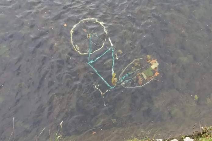 A discarded bike in the River Kent in Kendal <i>(Image: Simon Raven)</i>