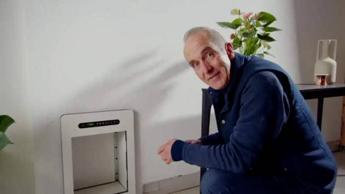 Kevin McCloud shows how the £1,500 cat flap in Grand Designs home works.