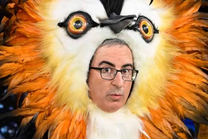 THE TONIGHT SHOW STARRING JIMMY FALLON -- Episode 1871 -- Pictured: Comedian John Oliver (dressed as a püteketeke bird) during an interview on Wednesday, November 8, 2023 -- (Photo by: Todd Owyoung/NBC via Getty Images)