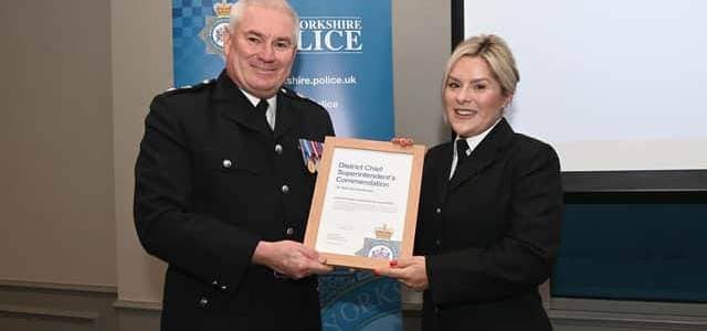 PC Gemma Brown receiving the Solving Problems with Partners Award from Chief Superintendent Steve Dodds. Photo: West Yorkshire Police