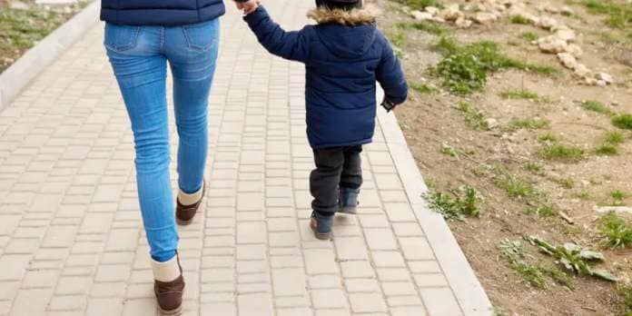 mom and child walking outside- letting go of fear