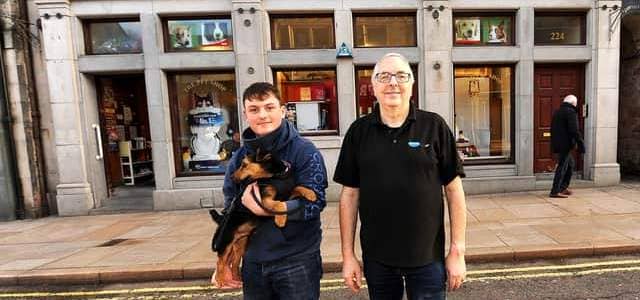 Ken Galloway from the Pet Shop with employee Dane Slack  & Trig the dog (Pic: Fife Photo Agency)