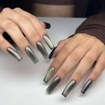 Try an eye-catching olive colored manicure with a cozy velvet finish.