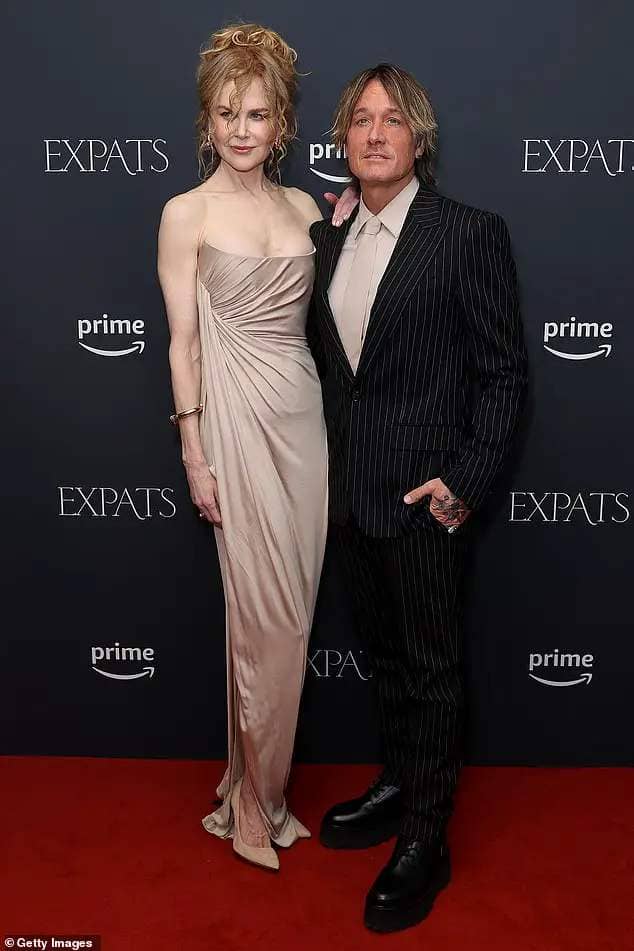 It comes weeks after a source close to Nicole told DailyMail.com: 'Nicole feels sexier than ever being over 50 and showing skin - and her true fans applaud her for it.' (Nicole pictured with husband Keith Urban on December 20, 2023)