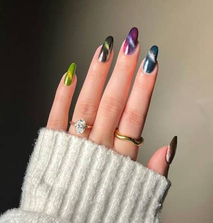 Try a colorful Skittle manicure with cat eye details.