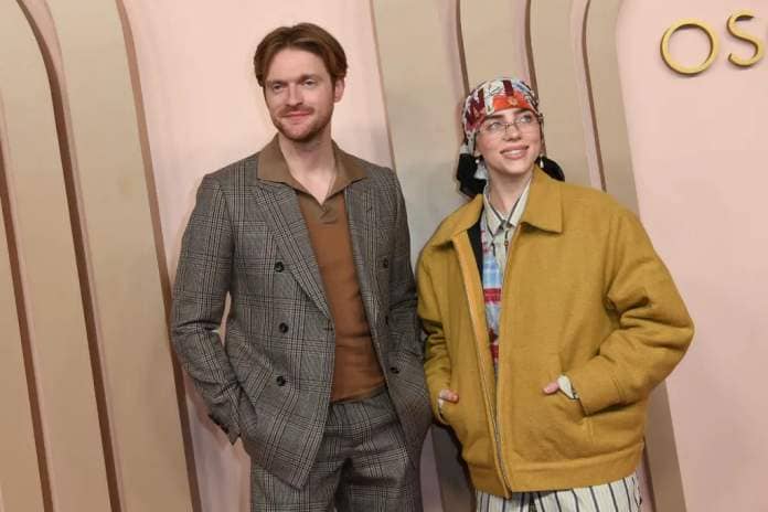 US singer-songwriter Finneas O'Connell (L) and US singer/songwriter Billie Eilish attend the Oscar Nominees Luncheon at the Beverly Hilton in Beverly Hills, California, on February 12, 2024. (Photo by Valerie MACON / AFP) (Photo by VALERIE MACON/AFP via Getty Images)