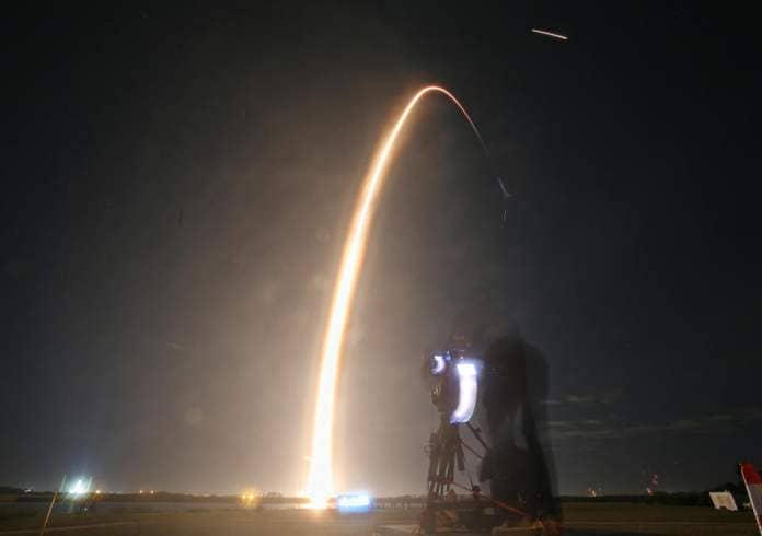 Light from the SpaceX Falcon 9 rocket launch is seen from Cape Canaveral.
