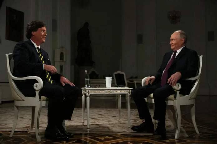 Russia's President Vladimir Putin gives an interview 