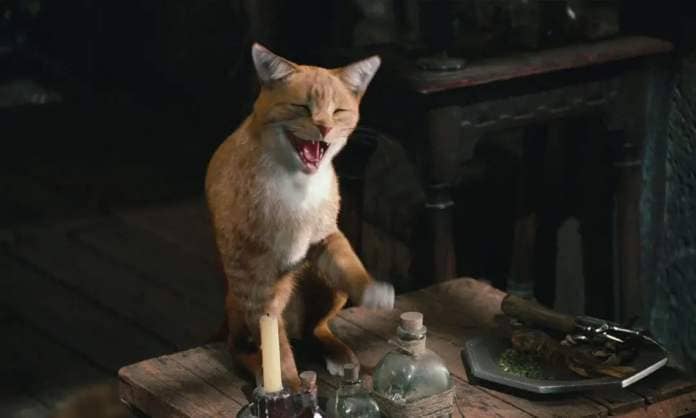 Azrael, an orange tabby in the live-action Smurfs movies, laughs with a distinctly unrealistic CG grin in The Smurfs 2