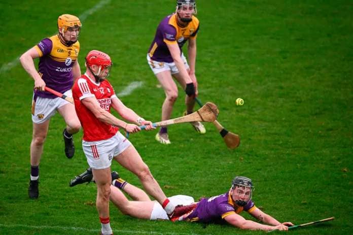 Wexford players Simon Donohoe, left, Eoin Ryan and Conor Foley look on as Alan Connolly of Cork scores his side's second goal at Chadwicks Wexford Park in Wexford. Photo by Ray McManus/Sportsfile