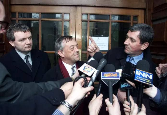 Charlie Bird with Ed Mulhall, then head of news at RTÉ, and Kevin Healy, then head of public affairs, after RTÉ won costs against Beverley Cooper-Flynn. Photo: Collins