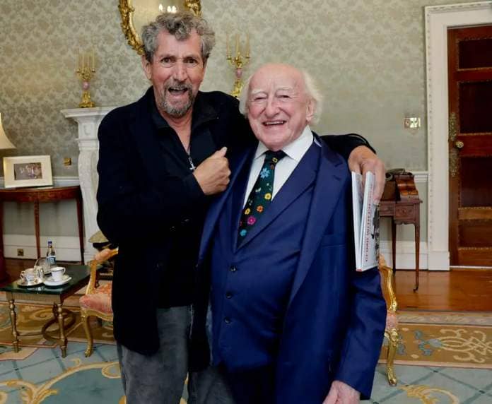 Charlie with President Higgins