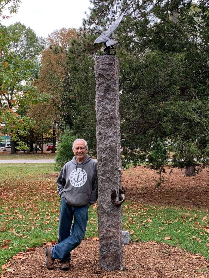 David Smus with his bird memorial in Deering Oaks Park in Portland, Maine. 