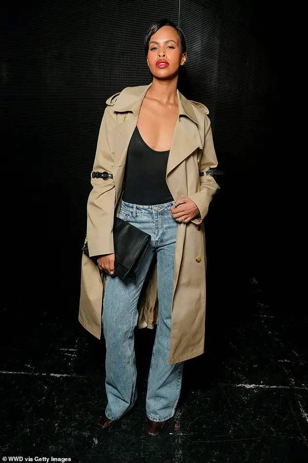 Sabrina Elba looked chic in long blue denim jeans and a plunging strappy top as she arrived for the PFW show