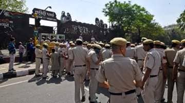 Arvind Kejriwal News LIVE: Police personnel stand guard at Shaheedi park during AAP supporters protest against the arrest of Delhi CM and party national convener Arvind Kejriwal by the Enforcement Directorate (ED). (ANI)