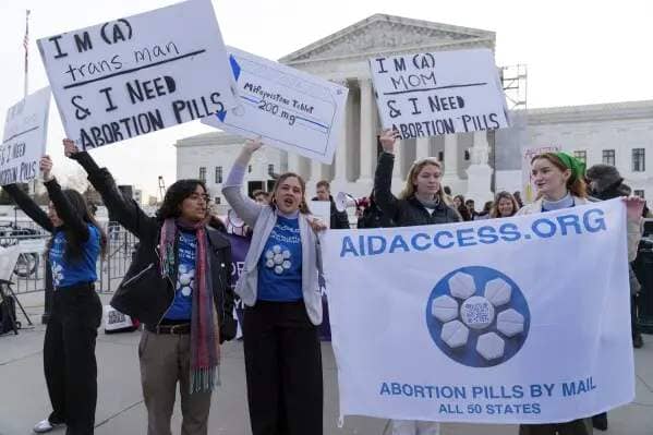 Abortion-rights activists rally outside of the Supreme Court, Tuesday, March 26, 2024, in Washington. (AP Photo/Jose Luis Magana)