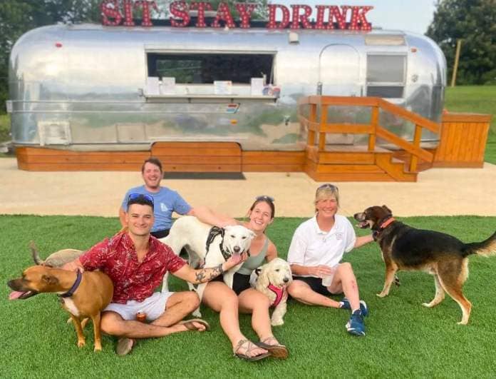 Dogs treat their owners to a day in the park at Barks N Brews in Macon. The park offers a fenced-in area for dogs to run off-lease as well as an outdoor bar for owners.