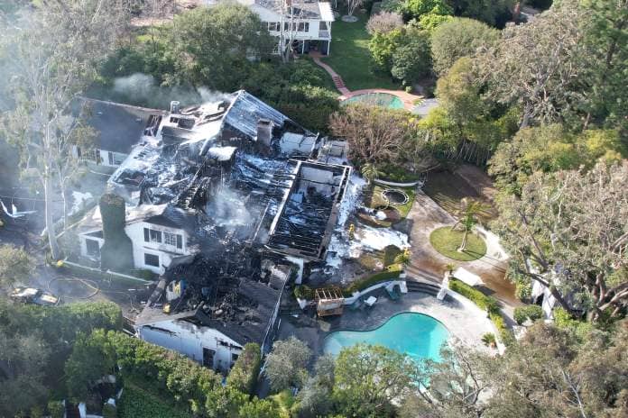 The model's £5million LA mansion was gutted by the brutal blaze