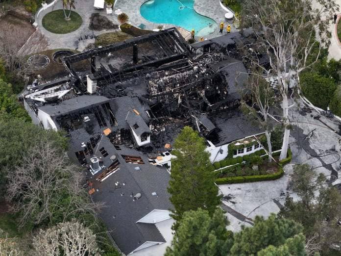 Cara's charred mansion following the fire