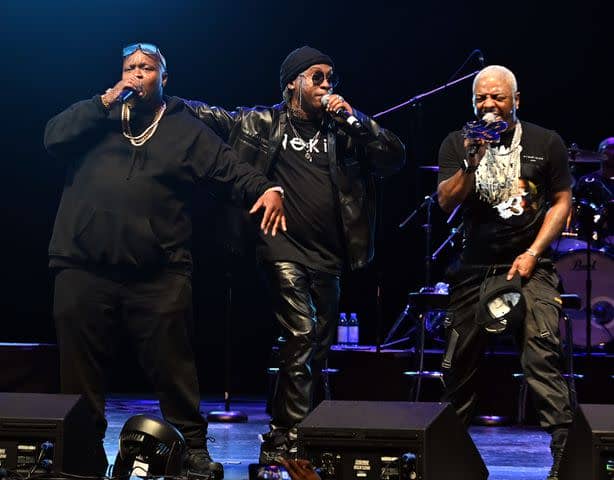 <p>Paras Griffin/Getty</p> Jazz, Nokio, and Sisqo of Dru Hill performing in Georgia in July 2022