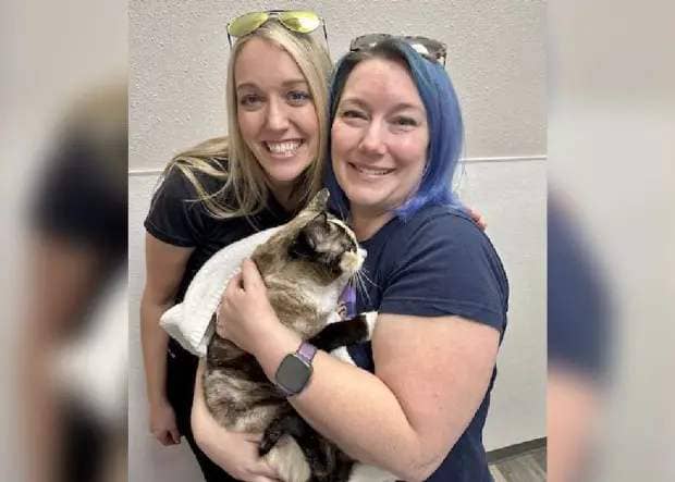 Carrie Clark, left, with Brandy, the Amazon employee who helped her find her cat. (Courtesy of Carrie Clark)
