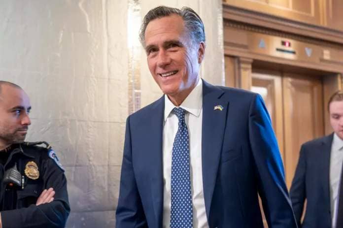 Mitt Romney arrives at the Capitol in Washington (AP)