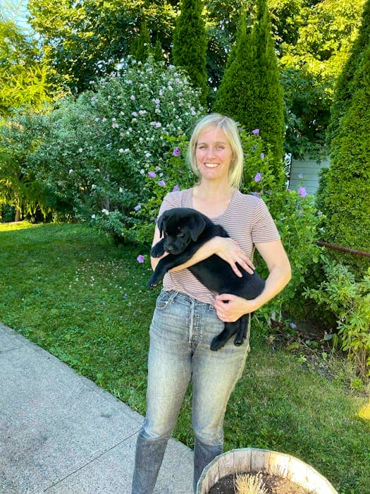 Lindsay Macdonald is shown with Arrow, a pure-bred Labrador Retriever puppy arriving at her new home in Halifax in September 2022 from Everwood Labs. - Contributed